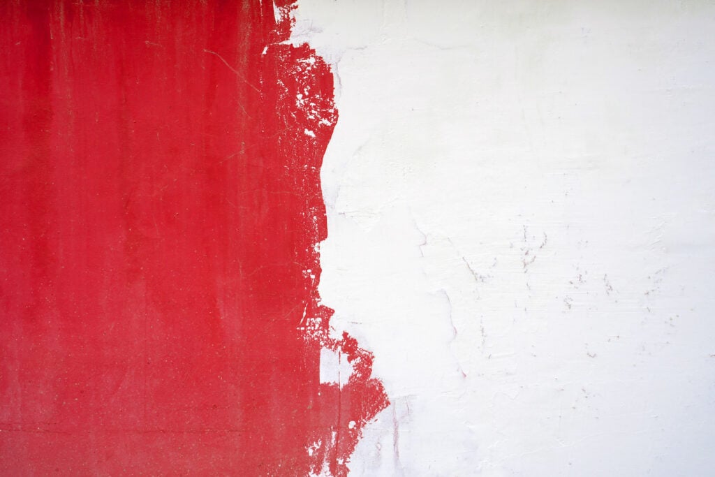Red paint on white wall