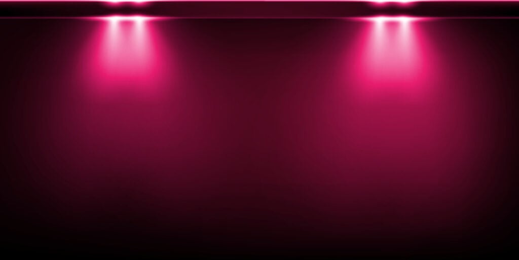 Pink lights on black background