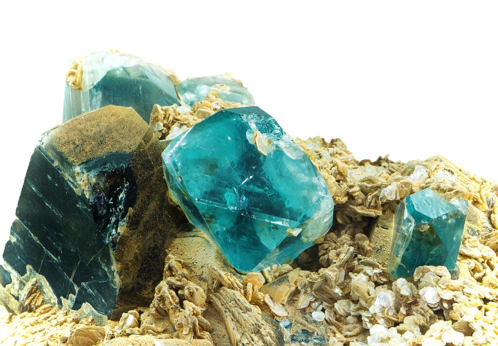 Close up of raw Smoky Quartz and blue Topaz.