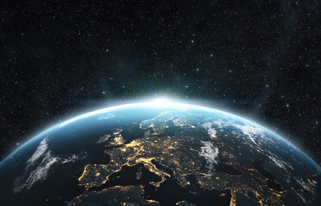 Planet Earth from space at night over the European continent.