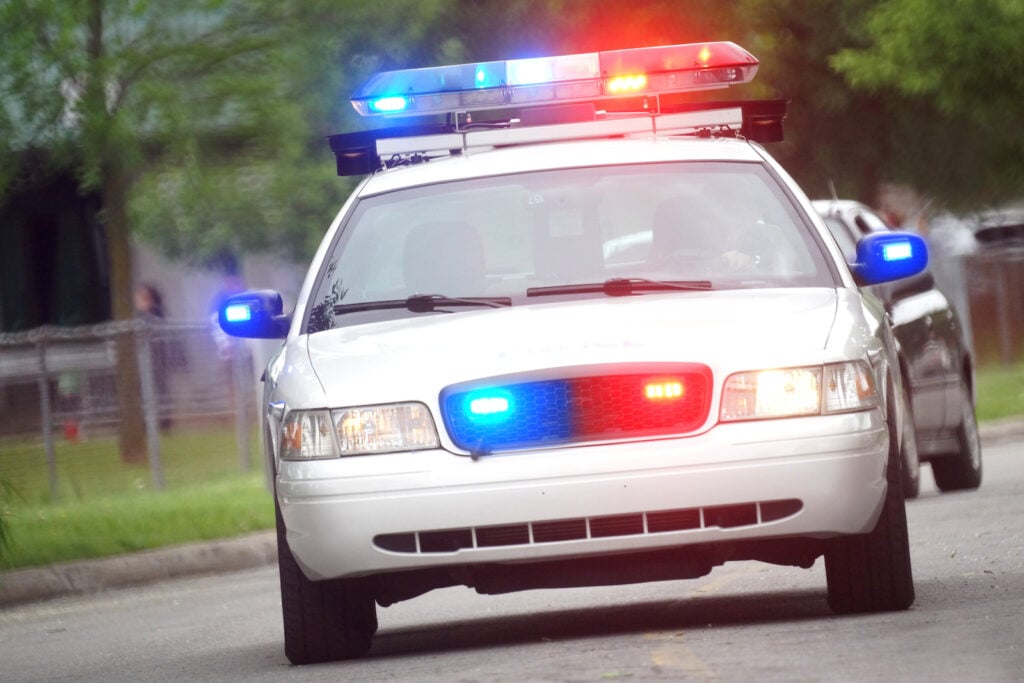 Police car with flashing lights
