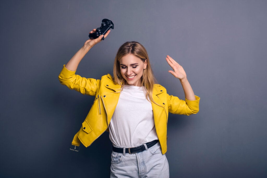 Woman in yellow jacket with white shirt. 