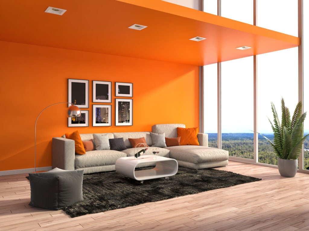 Orange interior design with a view over the forest