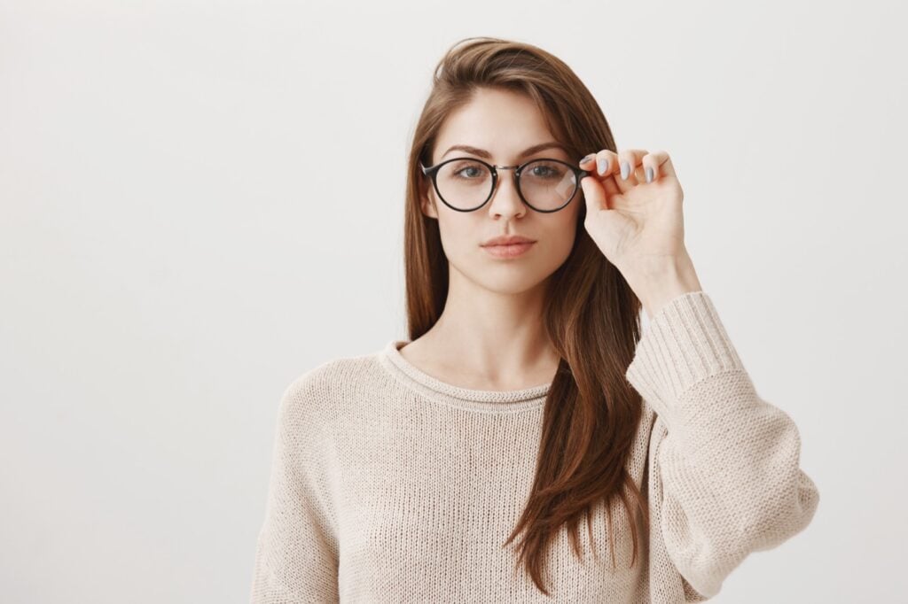 Smart-looking brunette with glasses