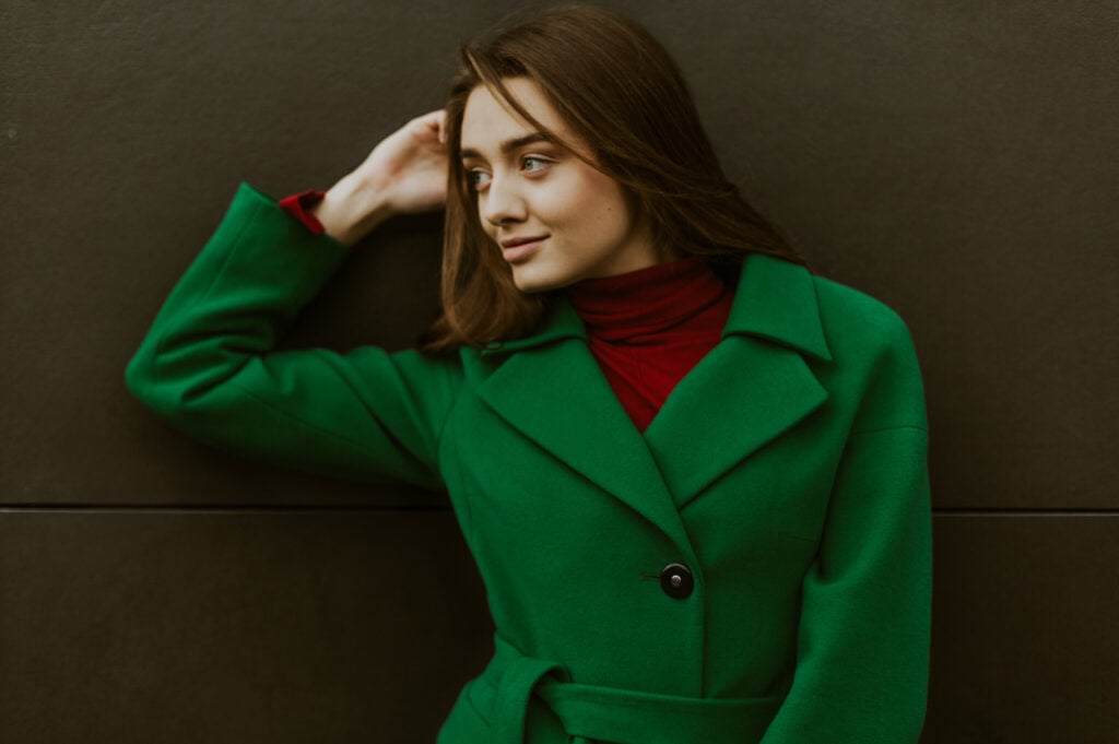 Woman wearing green jacket