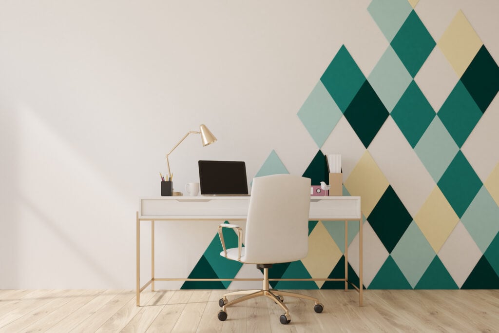 White and green diamond pattern home office with a wooden floor.