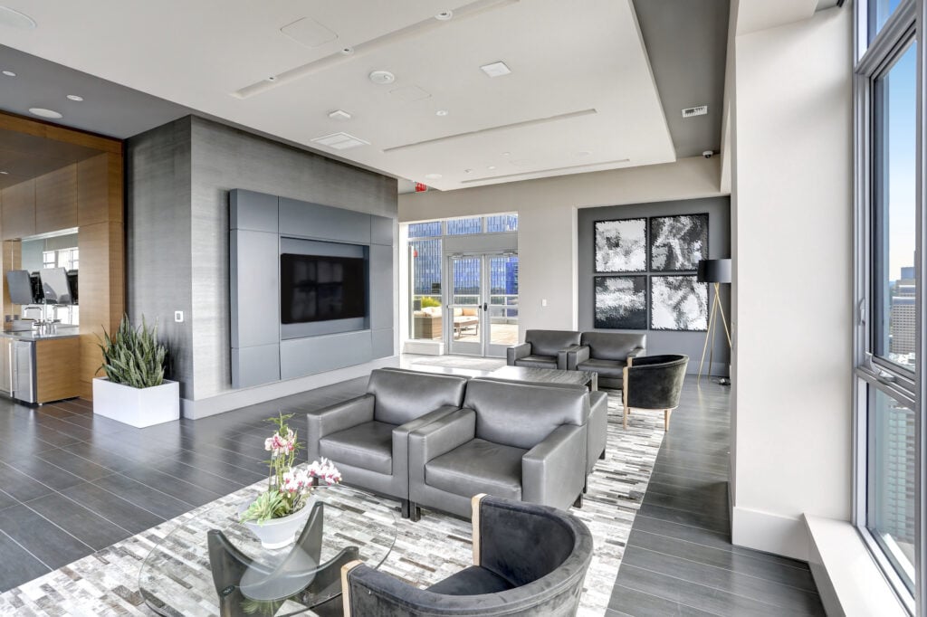 Modern interior design of living area with silver furniture.