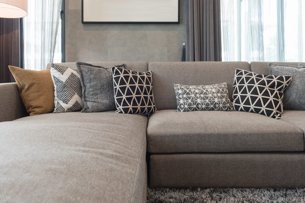 Luxury living room style with taupe couch.