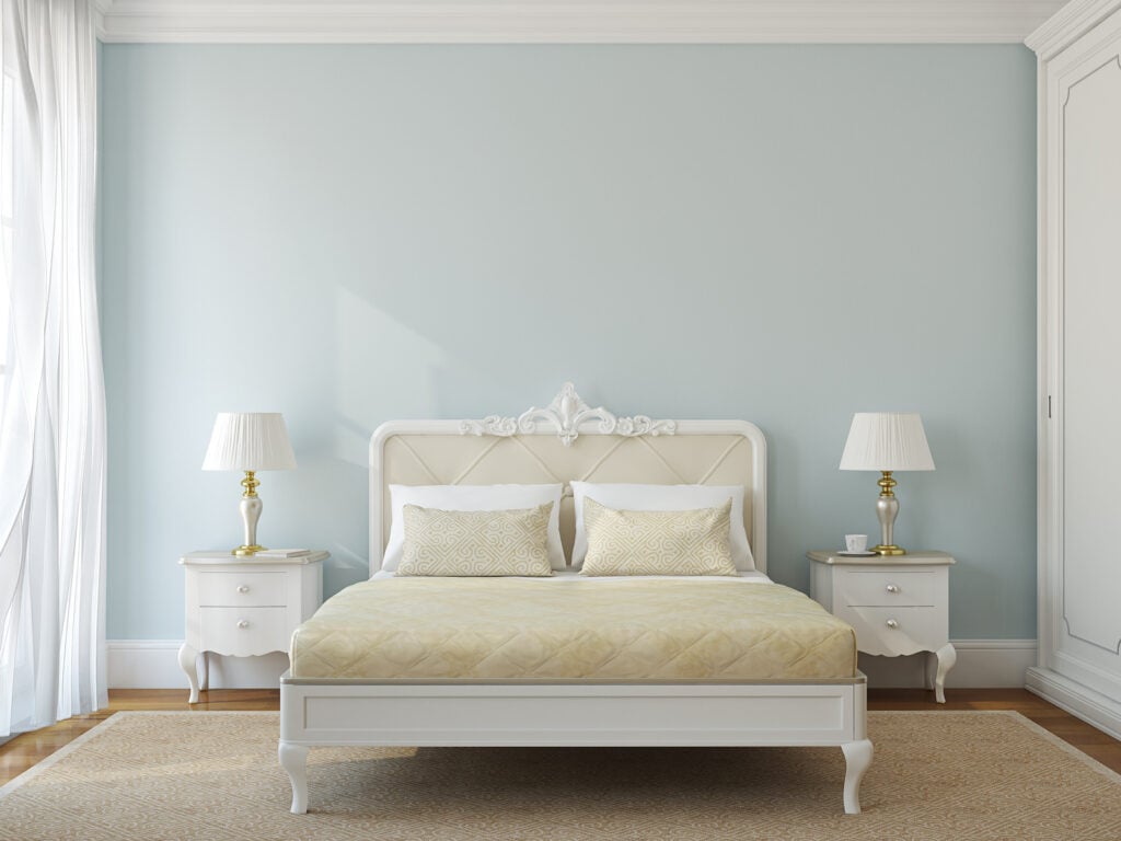 Classical baby blue bedroom interior.