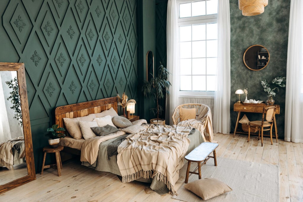 Bedroom with forest green walls.