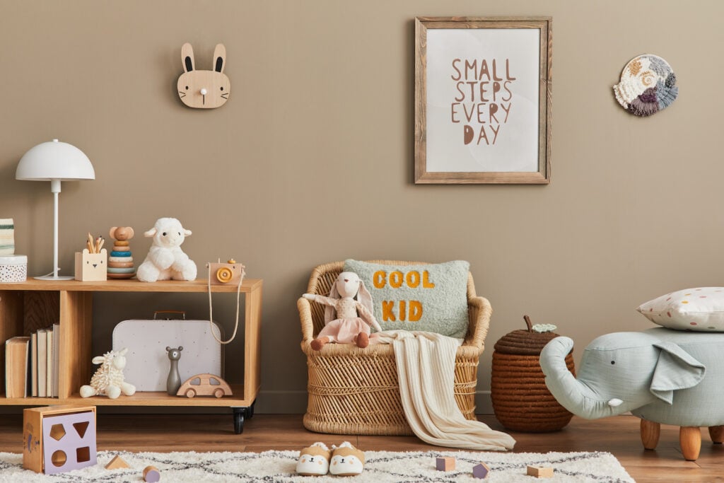 Stylish Scandinavian kid room with taupe walls.