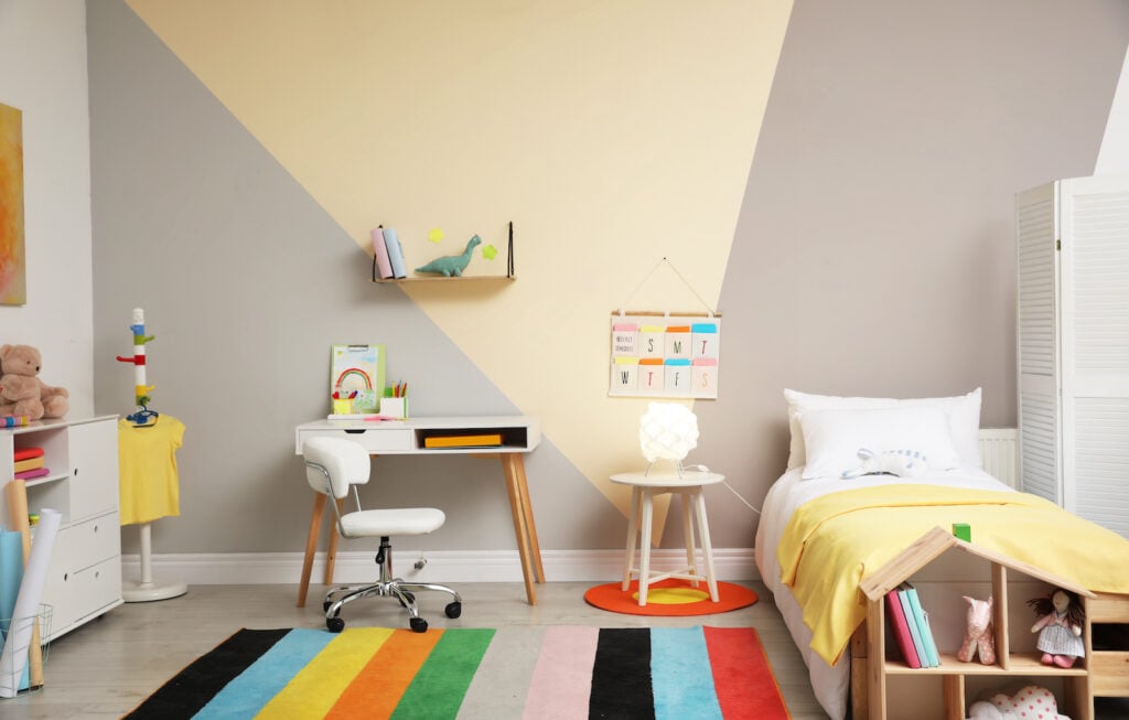 Stylish child's room with warm grey walls.