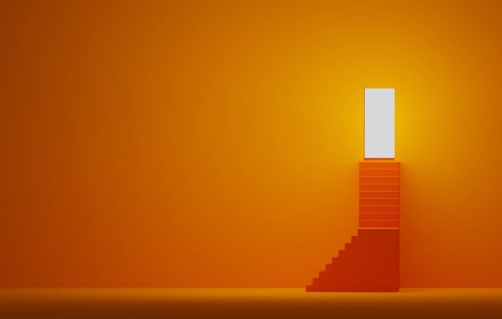 Abstract orange stairs lead to illuminated doorway in orange wall
