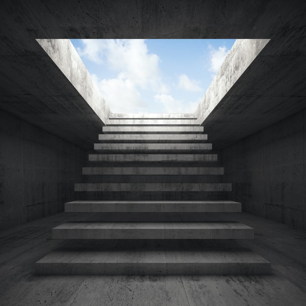 An image of a gray floating staircase leading out of the ground and up toward the sky