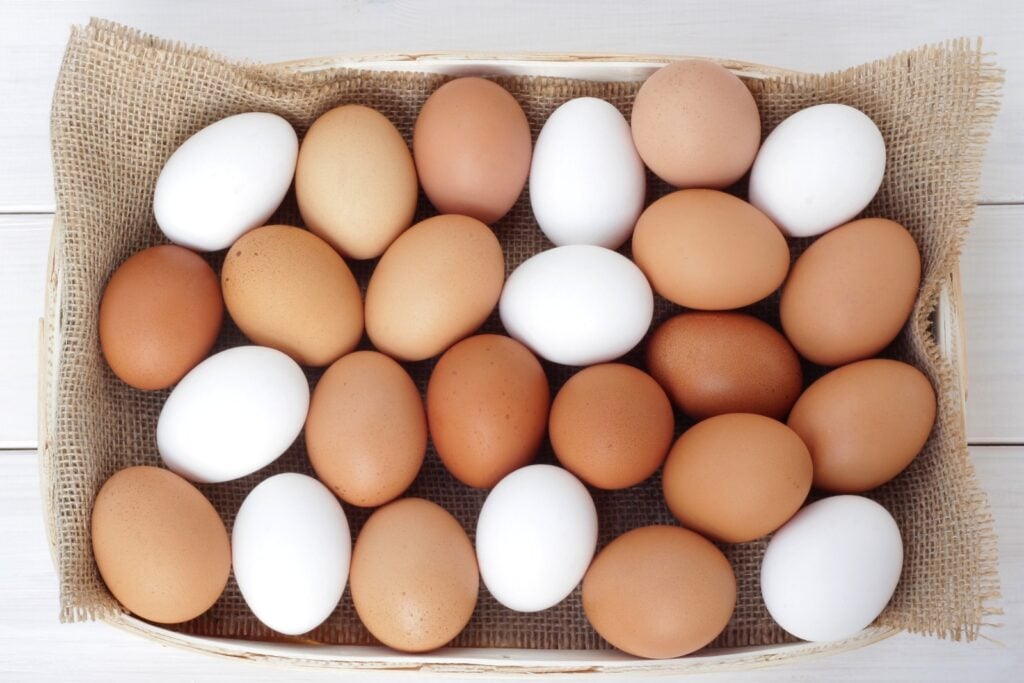Basket of brown and white eggs