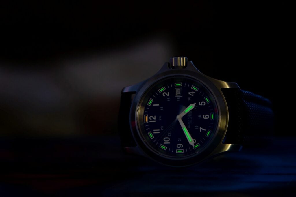Watch with glowing green details