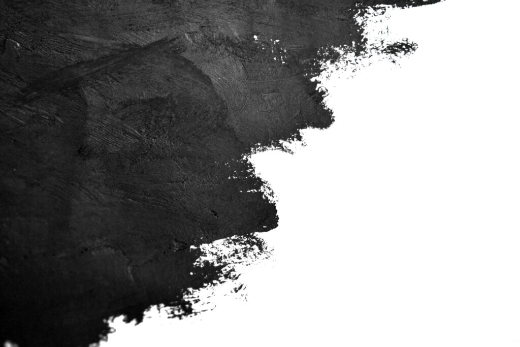 Black brush strokes on white background