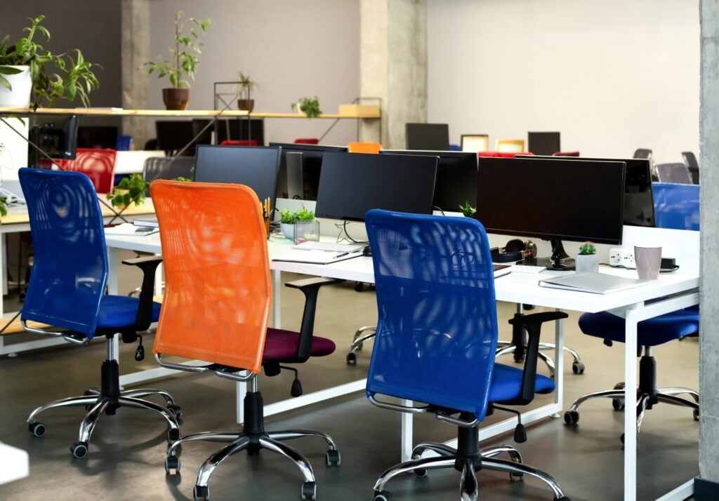 Office with blue and orange chairs