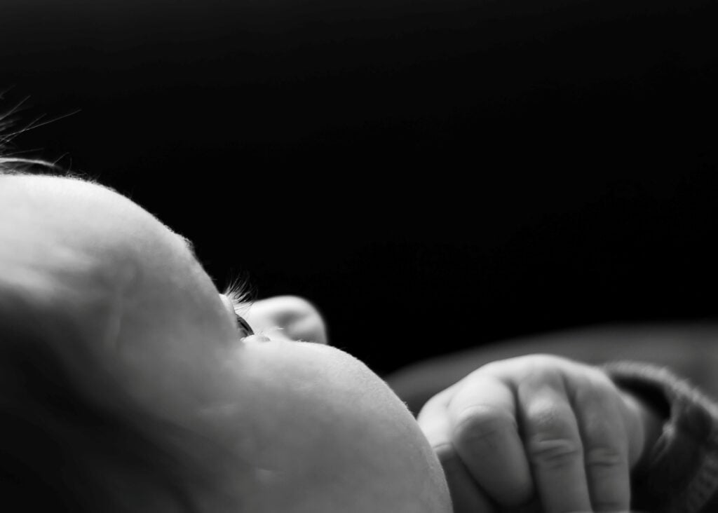 Black and white baby with eyes open