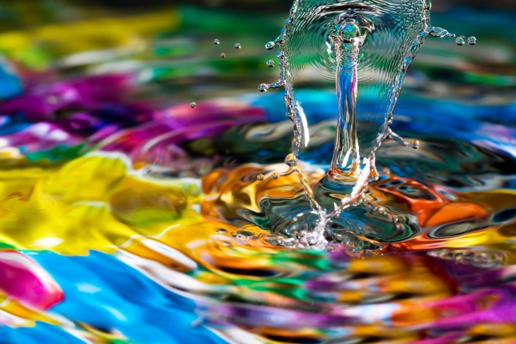 Vibrant colors beneath water drop