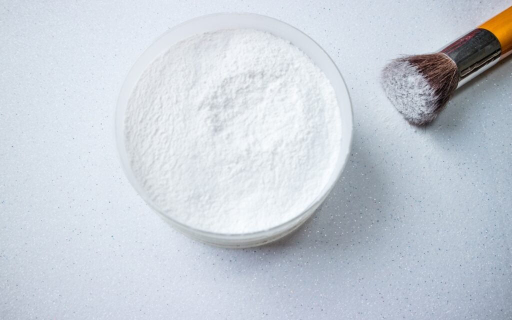 White face powder with brush