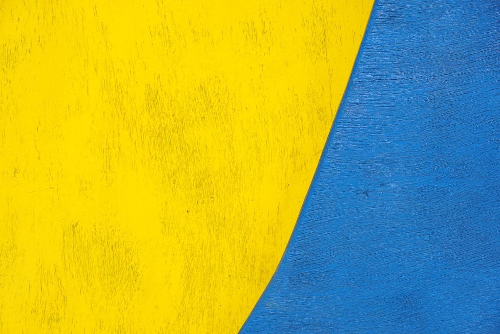 Blue and yellow colored wood
