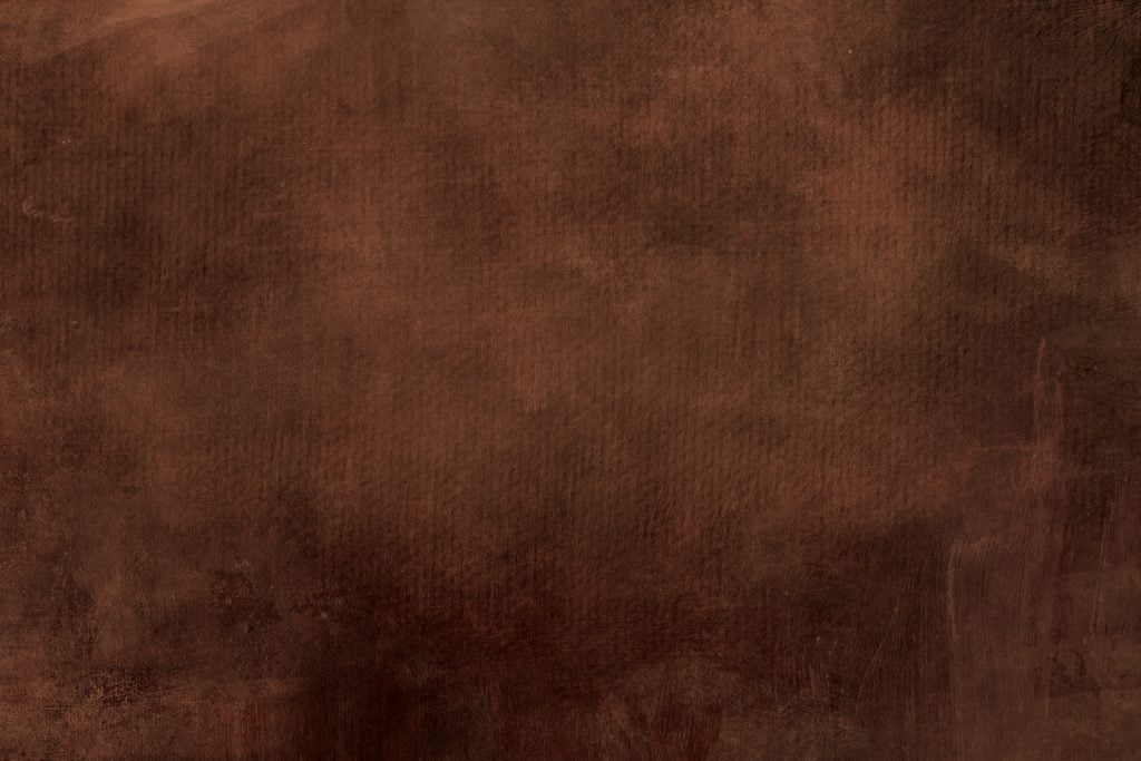 Brown colored texture with a red tint to it