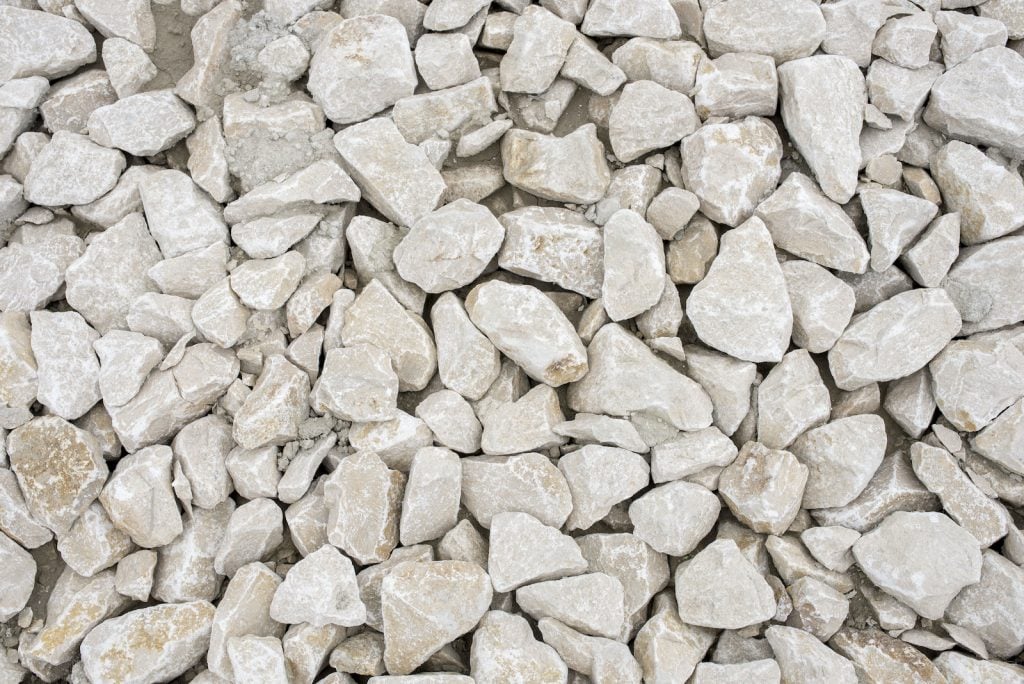 Limestone is white rock that is used for many things.