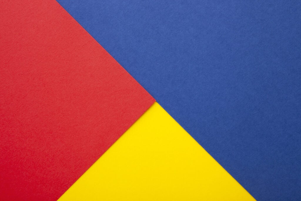 Red, yellow, and blue colored paper