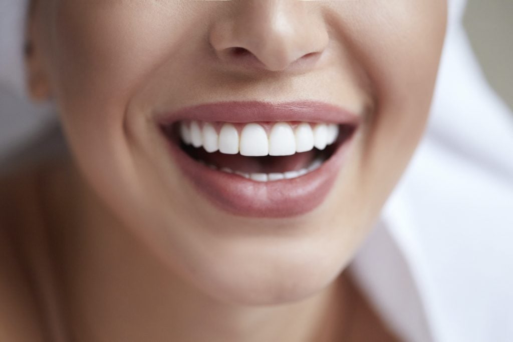 Teeth are white because enamel is primarily made of calcium phosphate.