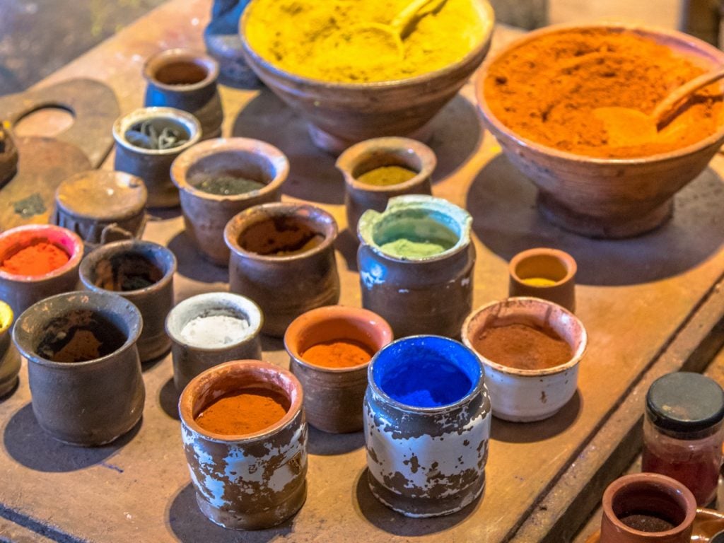 Colored pigment powders in old jars