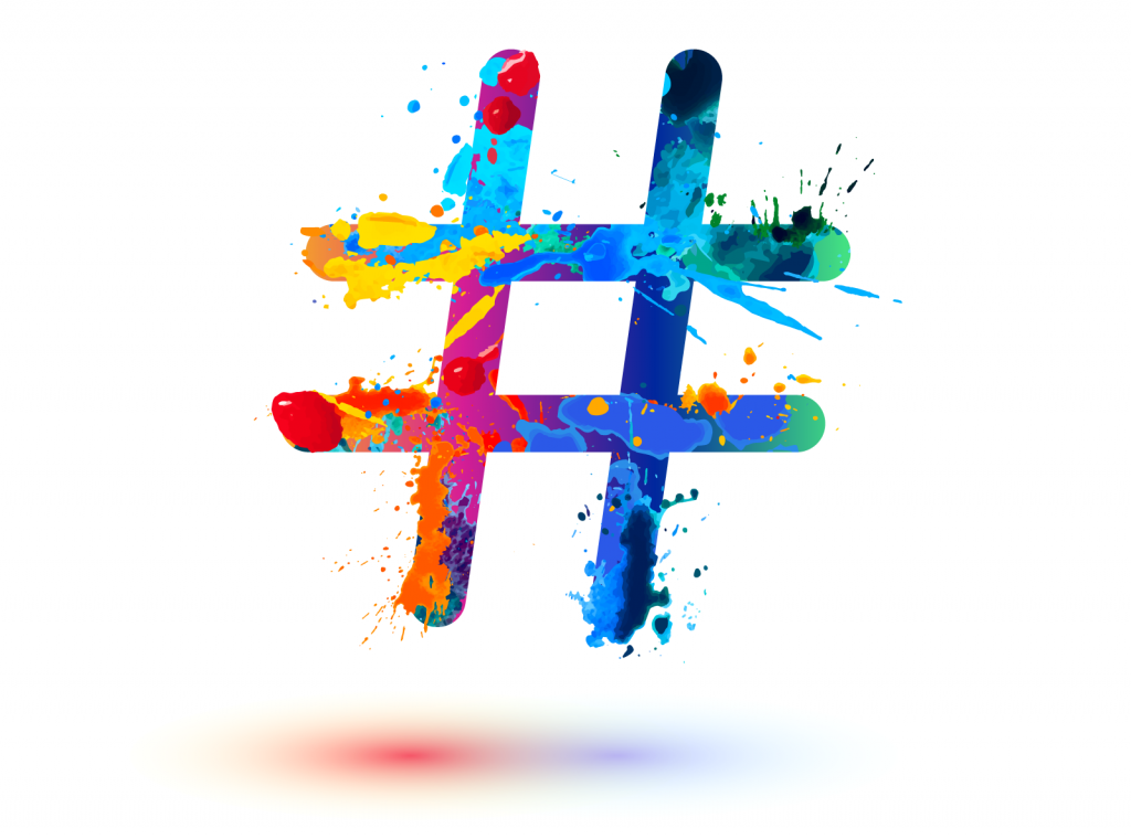Colorful hashtag sign with splashes of paint