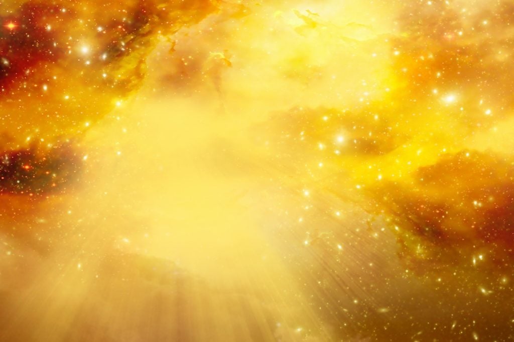 Divine sky with light and stars in yellow colors
