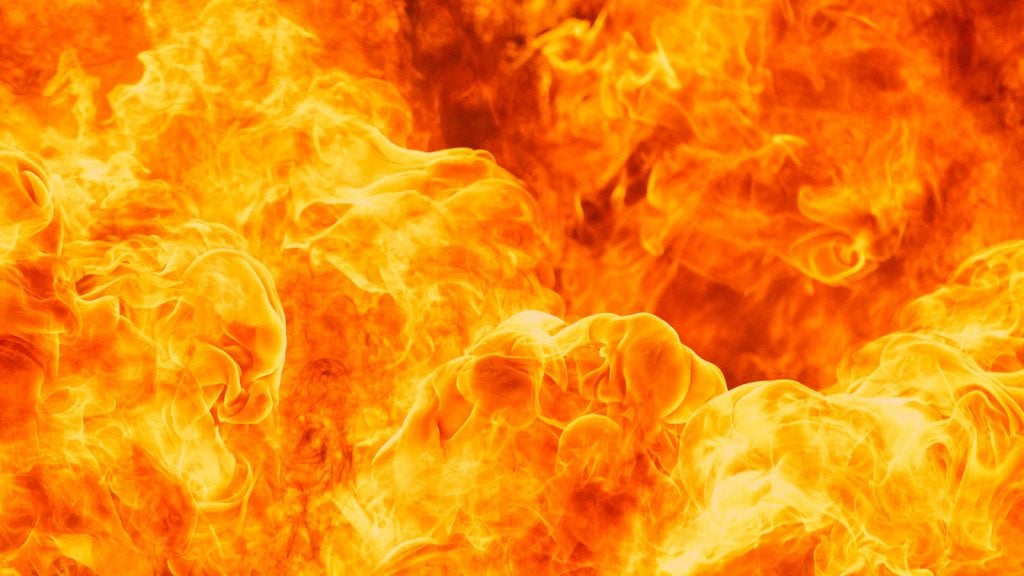 Blazing fire flames in yellow and orange colors