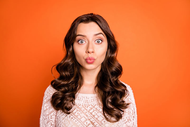 Woman on orange background