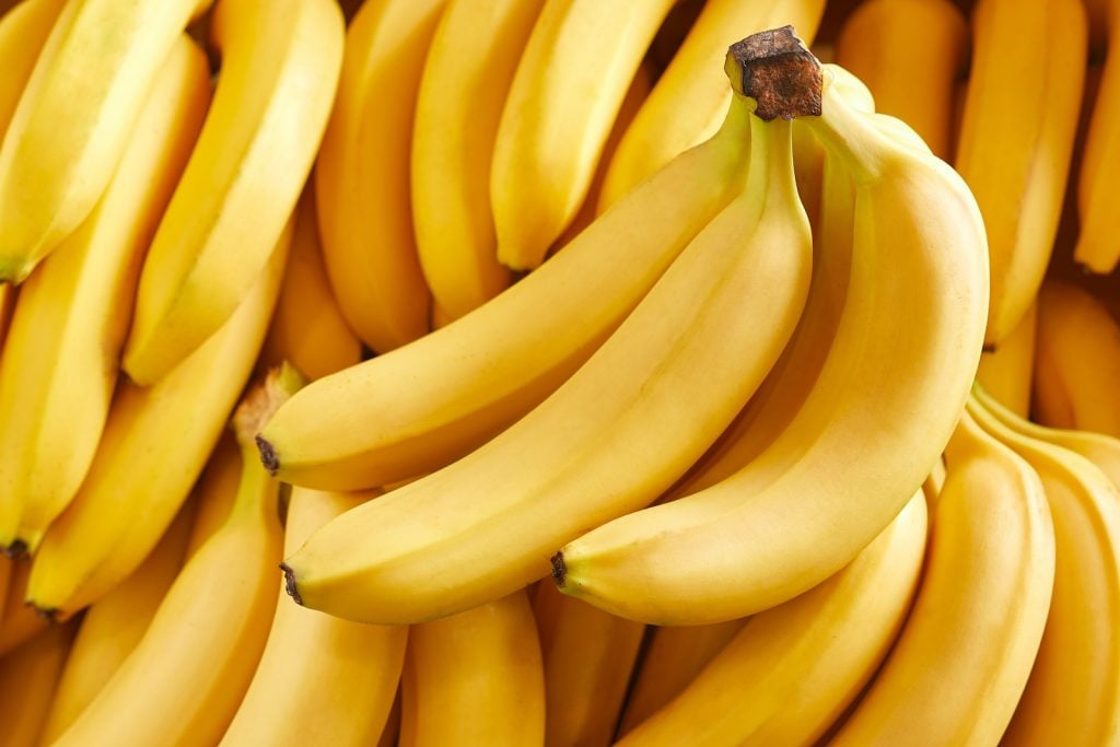 Overheadview of a pile of fresh yellow bananas 