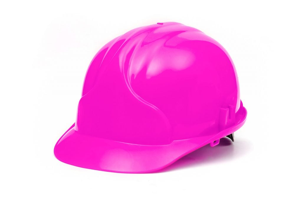 Pink hard hat isolated on white background