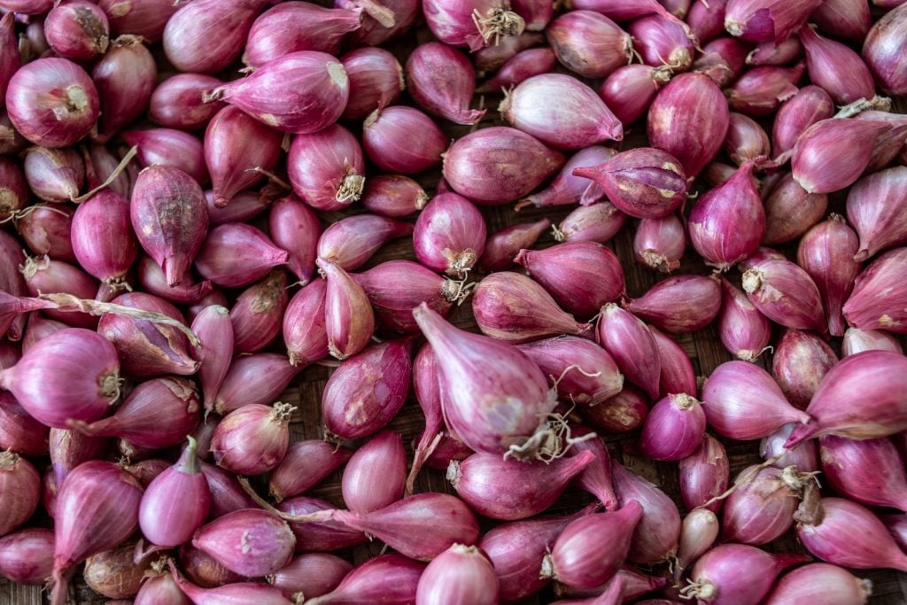 Pile of Shallot onions at a market